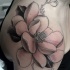 Engraving style colored shoulder tattoo of big lotus flower