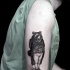 Engraving style colored shoulder tattoo of little raccoon gentleman