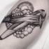 Engraving style cool looking leg tattoo of fighter plane with clouds