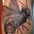 Engraving style detailed biomechanical bee tattoo on leg