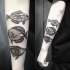 Engraving style very detailed arm tattoo of cute fishes