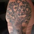 Family tree tattoo on shoulder