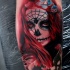 Fantastic illustrative style forearm tattoo of Mexican traditional woman portrait