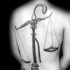 Fantasy style black ink whole back tattoo of simple libra