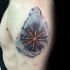 Fantasy style colored shoulder tattoo of magical rune with mystical symbol