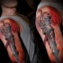 Fantasy style colored shoulder tattoo of fantasy angel warrior