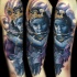 Fantasy style colored sleeve tattoo of Buddha baby