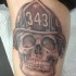 Tatuaje en el brazo conmemorativo de un bombero.