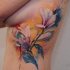Tatuaggio sul fianco i fiori incantevoli
