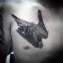 Flying down eagle detailed realistic tattoo on chest