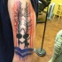 Funny cartoon style colored shoulder tattoo of funny forest people