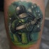 Funny cartoon turtle playing electric guitar colored tattoo on man's calf by Dmitry Varlakov