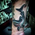 Funny design colored old school style shark tattoo on forearm area