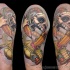 Funny designed and colored shoulder tattoo of skeleton and pencils in snake head