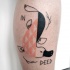 Funny looking colored leg tattoo of interesting animal with lettering