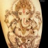 Tatuaggio colorato Ganesha con loto by Miguel Angel