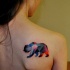 Geometric bear tattoo on shoulder blade