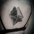 Geometrical style black ink back tattoo of rhomb with butterfly