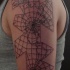 Geometrical style black ink shoulder tattoo of big world map