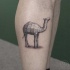 Geometrical style colored leg tattoo of typical camel