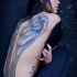 Tatuaje  de alas largas elegantes en la espalda