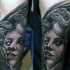 Tatuaje en el brazo, rostro de Medusa Gorgona asombrosa