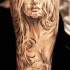 inchiostro grigio bella  ragazza santa morte tatuaggio