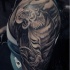 Gray washed shoulder tattoo of tiger with moon
