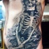 Gray washed style large side tattoo of Grimm reaper
