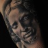 Gray washed style medium size biceps tattoo of antic statue