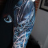 Great Alien tattoo in blue color