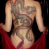 Great colorful  dragon tattoo for women