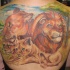 grande colorata famiglia di leone tatuaggio sulla schiena