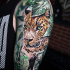 Great Jaguar and Explorer tattoo on shoulder