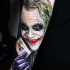 Great realistic Joker tattoo on sleeve