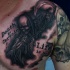 Tatuaje en el pecho, la muerte y cráneos