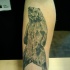 Tatuaggio sul braccio l'orso grizzly
