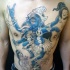 Half colored chest and belly tattoo of Hinduism God