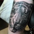 Half realism half geometric style black and white shoulder tattoo of tiger head