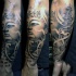 Hinduism style black and white forearm tattoo of Buddha statue and old temple