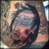 Homemade Asian style colored bloody man head with arrow