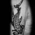 Homemade like black ink shoulder tattoo of Polynesian style shark