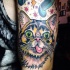 Homemade style colored shoulder tattoo of funny cat with stars