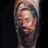 Horror style colored leg tattoo of vampire portrait