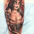 Horror style colored leg tattoo of zombie woman with apple and bow