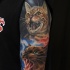 Horror style creepy looking shoulder tattoo of vampire cat