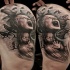 Horror style creepy looking thigh tattoo of terrifying women and crows