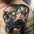 Horror style detailed chest tattoo of human skull with sleeping child