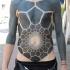 Tatuaje en el cuerpo, ornamento masivo impresionante negro