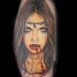 Illustrative style colored arm tattoo of bloody vampire woman